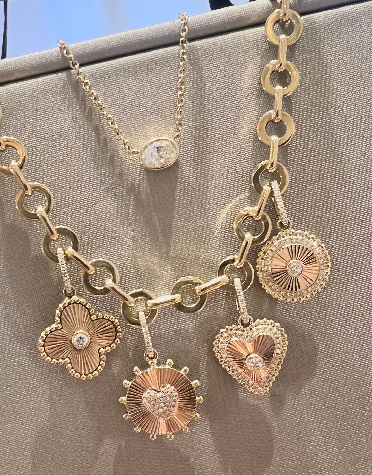 Fluted heart charm with openable bail