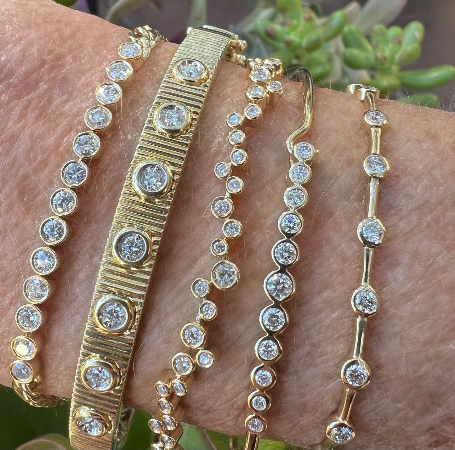 Dancing diamond tennis bracelet