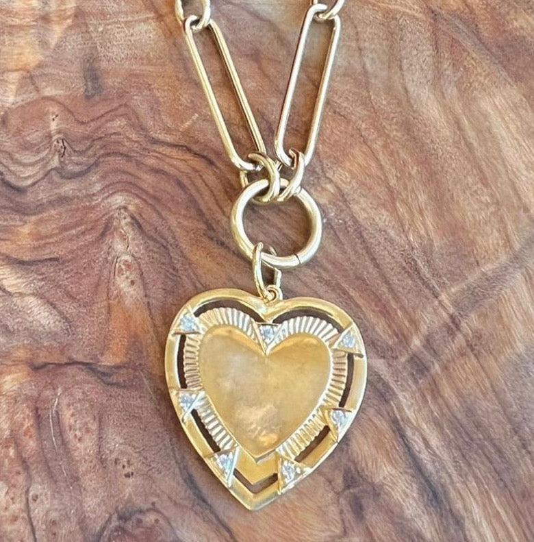 Diamond and gold heart charm