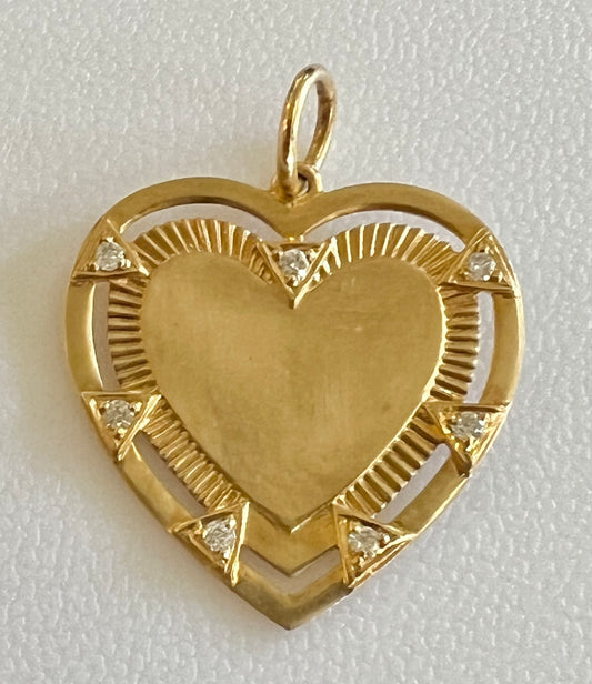 Diamond and gold heart charm