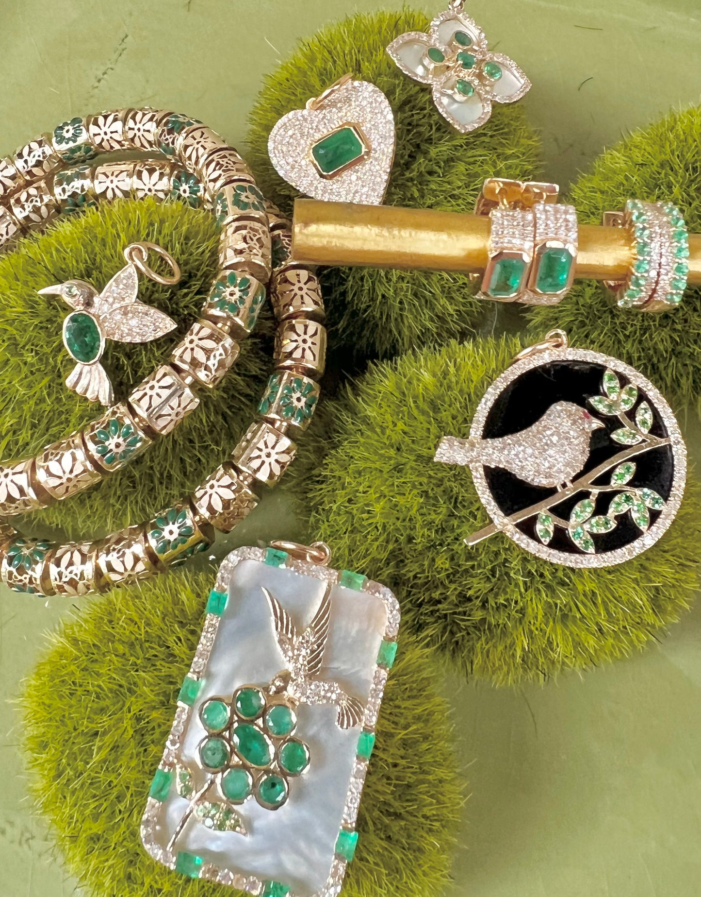 Gold, diamond and emerald hummingbird pendant