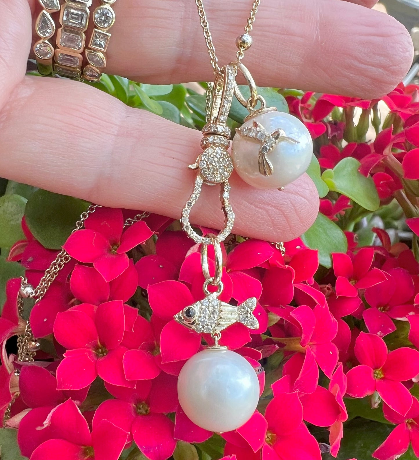 Pearl charm with diamond hummingbird