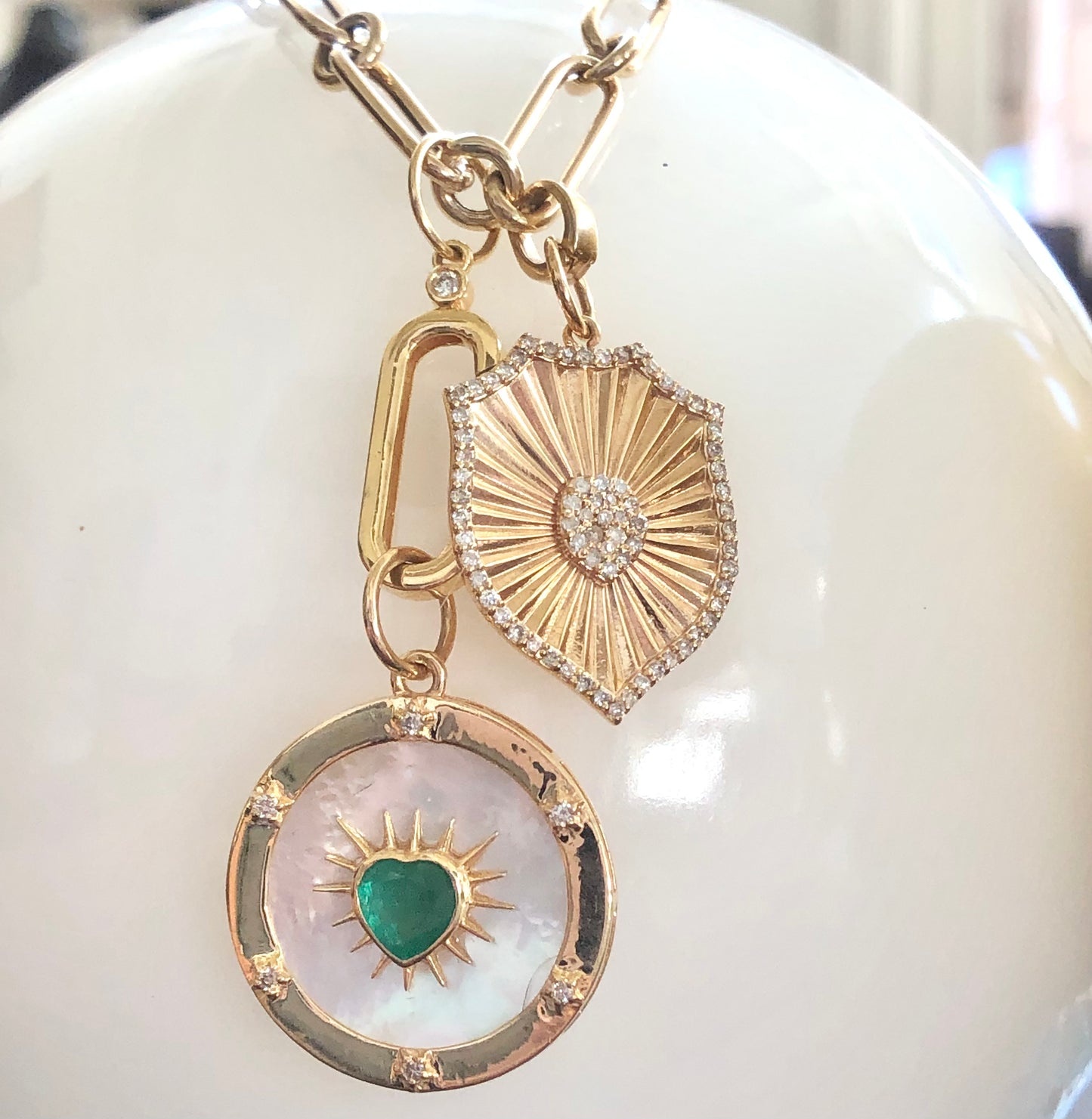 Mother of pearl and emerald charm