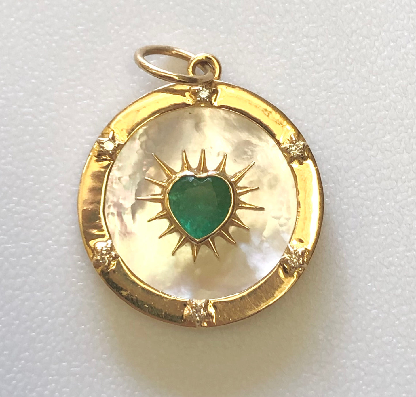 Mother of pearl and emerald charm