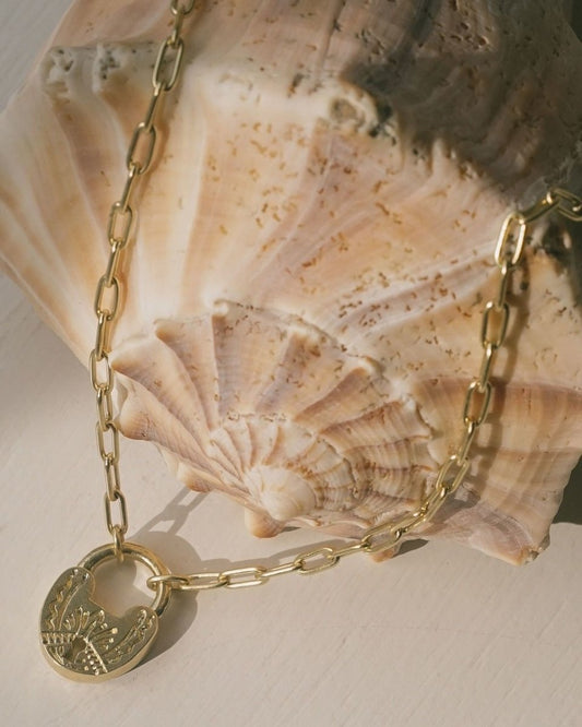 Gembok pendant necklace.