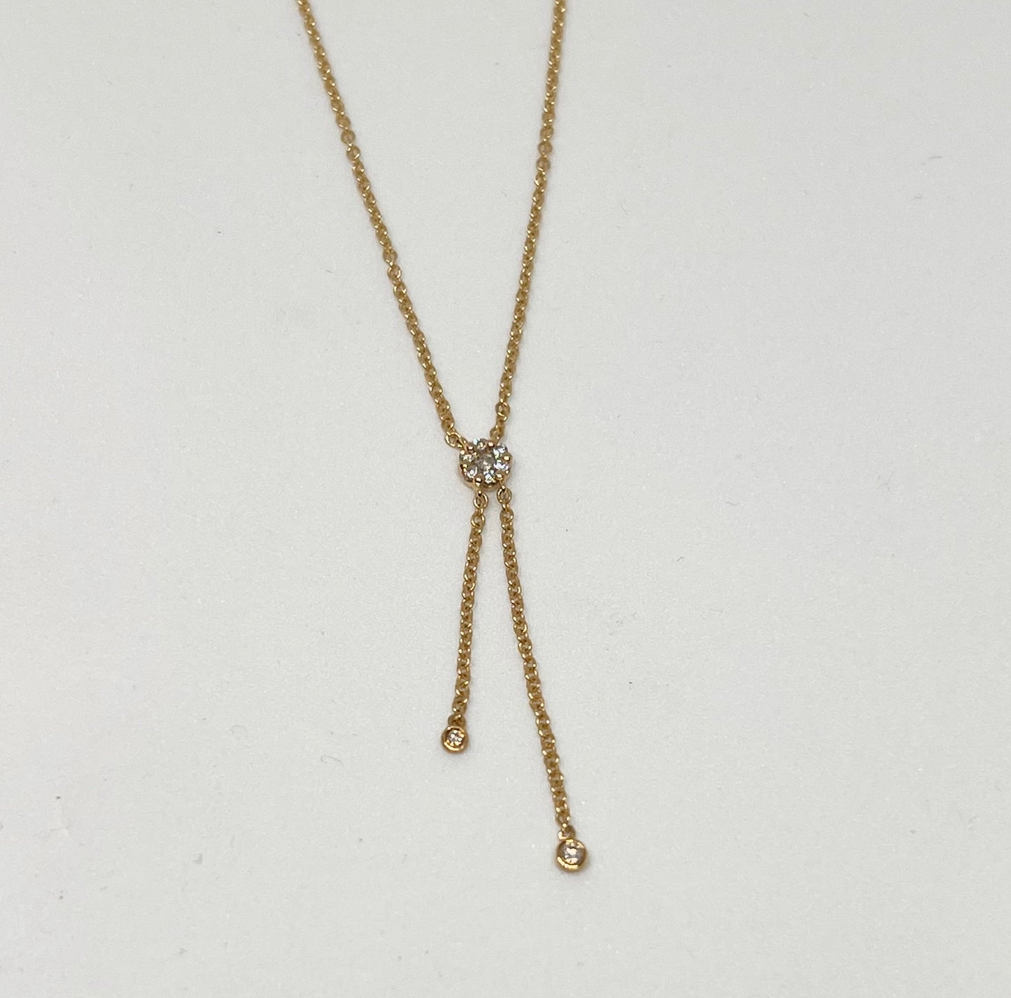 Gold and diamond lariat